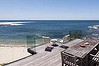 A private beachfront residence at 15 Shipton Crescent in Mollymook is one of the high end properties on the south coast market.