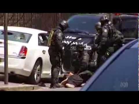 Riot Squad swoop to end standoff outside NSW Parliament