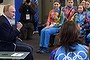 Russian President Vladimir Putin speaks to Olympic volunteers in Sochi, Russia.