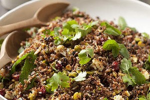 Quinoa and red rice salad with spicy cauliflower and black lentils.