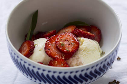 Lemon verbena ice cream with strawberries and Szechuan pepper.