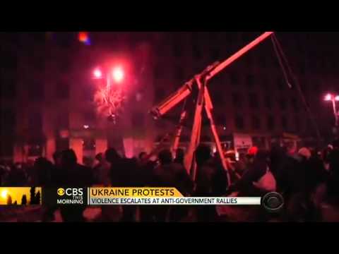 From:   Please like PigMine\'s FaceBook page here:  Subscribe to   January 21, 2014 - Political street violence in Kiev, Ukraine, has been occurring for a couple of months, but new levels of violence in the last few days are pushing Ukraine\'s standoff toward some sort of a tipping point. CBS News correspondent Mark Phillips reports.  FAIR USE NOTICE: This video may contain copyrighted material. Such material is made available for educational purposes only. This constitutes a \'fair use\' of any such copyrighted material as provided for in Title 17 U.S.C. section 106A-117 of the U.S. Copyright Law.