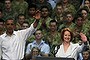 U.S. President Barack Obama waves to U.S. Marines and Australian troops at the RAAF Base in Darwin, November 17, 2011. At right is Australian Prime Minister Julia Gillard.