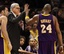 Los Angeles Lakers coach Phil Jackson congratulates guard Kobe Bryant (24) in the fourth quarter during an NBA basketball game against the New York Knicks at Madison Square Garden in New York, Monday, Feb. 2, 2009. Bryant had 61 points in the game as the Lakers won 126-117.