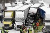 Trucks and passenger vehicles block eastbound Interstate 94 following a massive crash that killed three people and injured about 20 near Michigan City, Indiana.