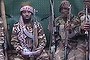 A screengrab taken on September 25, 2013 from a video distributed through an intermediary to local reporters and seen by AFP, shows a man claiming to be the leader of Nigerian Islamist extremist group Boko Haram Abubakar Shekau. The video, which comes after an outburst of violence in northeastern Nigeria, shows the man taunting world leaders after the military said he may have been killed.  
RESTRICTED TO EDITORIAL USE - MANDATORY CREDIT 