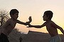 Afghan children play Ghursai, a traditional boy's game, in the countryside on the outskirts of Jalalabad, Nangarhar province.