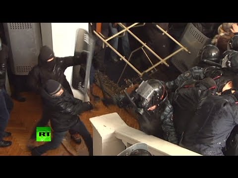 Violent video: Ukraine rioters brutally beat police, storm local admin building