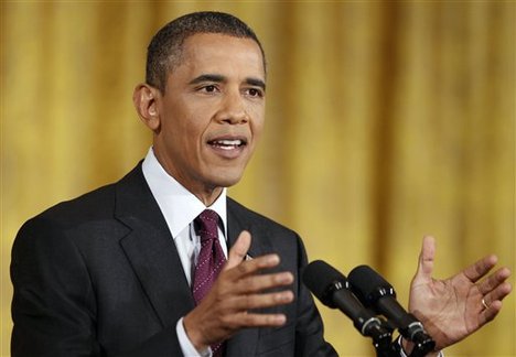 President Barack Obama gestures during a news conference in the East Room of the White House in Washington, Wednesday, June 29, 2011.