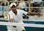 Indian Mahesh Bhupathi returns the ball to Germany during the semi-final men's doubles 2004 Summer Olympics in Athens ,Thursday, Aug. 19, 2004. Germany won 6-2, 6-3.