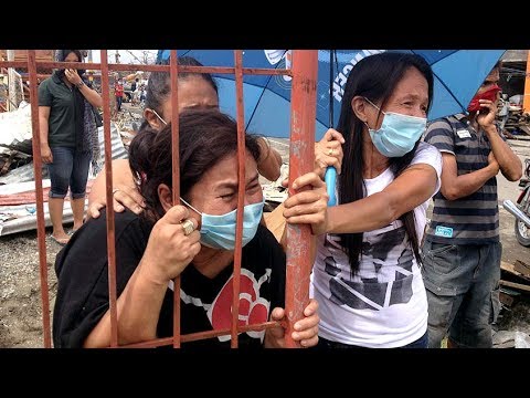 Typhoon Haiyan: Living with the dead in Tacloban