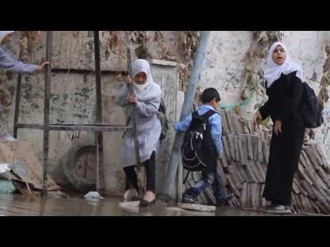 Children Navigate Sewage in the Streets of Al Sabra, Eastern Gaza City