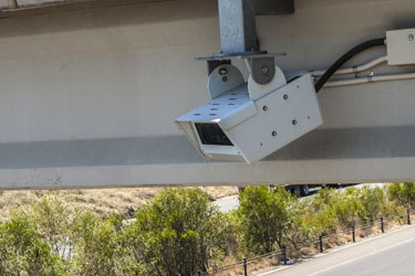 Speed camera commissioner Gordon Lewis told Neil Mitchell there was still unfinished business.