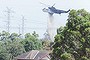 Water bomber in action at the Warrandyte fire today. Photo by James Boddington. Fairfax Media. NEWS. Sunday Febuary 9 2014