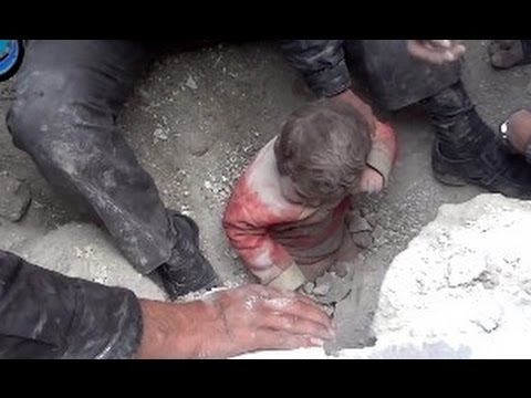 Using Bare Hands a Child is Saved from the Rubble!  #Syria