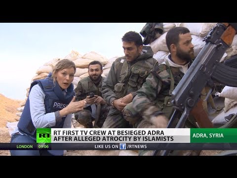 RT first TV crew at besieged Syria town after alleged atrocity by Islamists