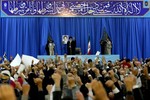 In this photo released by an official website of the Iranian supreme leader's office on Thursday, March 21, 2013, Iran's Supreme Leader Ayatollah Ali Khamenei waves to a crowd in northeastern Iran on the first day of the new Persian calendar year.