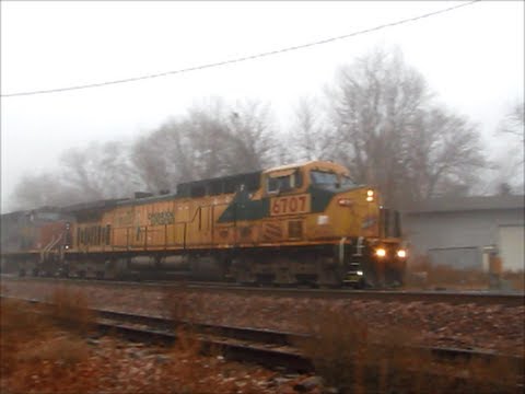 Patched CNW and SP led coal train meets UP's 