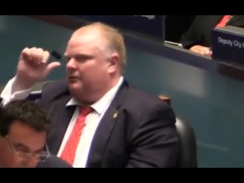 Toronto Mayor Rob Ford pantomimes drunk driving during City Council