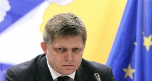 Slovakian Prime Minister Robert Fico listens to questions during a media conference at an EU summit in Brussels, Friday March 20, 2009.