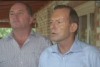 Abbott flags drought assistance package as rain falls in Bourke