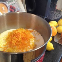 Leah adds citrus zest to sugar to make her syrup