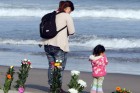 Praying for victims (Getty)