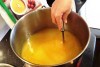 Leah stirs her citrus syrup