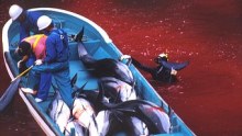 Japanese fishermen take part in the dolphin hunt in Taiji harbor.