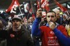 Workers on strike in Madrid join protest