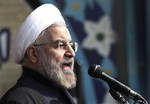 Iranian President Hassan Rouhani, delivers a speech during an annual rally commemorating anniversary of the 1979 Islamic revolution, at the Azadi 'Freedom' Square in Tehran, Iran, Tuesday, Feb. 11, 2014. Rouhani on Tuesday called for "fair and constructive" nuclear talks with world powers as the nation marked the anniversary of the 1979 Islamic revolution with massive rallies, complete with anti-American and anti-Israeli chants. Tuesday marks the 35th anniversary of the revolution that toppled the pro-U.S. Shah Mohammad Reza Pahlavi and brought Islamists to power.