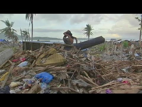 Aid agencies try to bring some Christmas cheer to the survivors of typhoon Haiyan