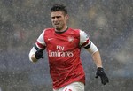 Arsenal's Olivier Giroud plays against Chelsea during their English Premier League soccer match at Stamford Bridge, London, Sunday, Jan. 20, 2013.