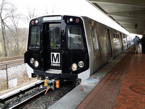 WMATA 7000-Series quad set departs Greenbelt Metro station