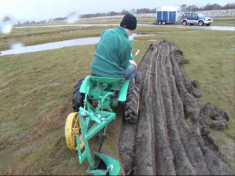 Bolens Ride a Matic 7hp tractor ploughing