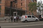 Journalists gather outside the channel Seven network's Sydney offices on Tuesday