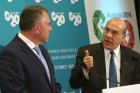 Angel Gurria (r) says the G20's challenge is to manage public expectation.