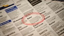 Job circled in a newspaper employment section