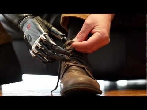 'Terminator' false arm ties shoelace and deals cards