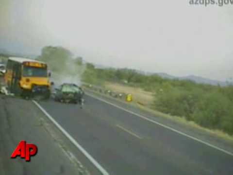 Raw Video: Car Hits School Bus Head-On