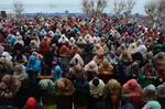 Kashmiri Muslims offer prayers on the Friday following Eid -e-Milad marking the birth anniversary of Prophet Muhammad, at the Hazratbal shrine in Srinagar, the summer capital of Indian Kashmir, 17 January, 2014.