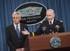 Army Gen. Martin E. Dempsey, chairman of the Joint Chiefs of Staff, and Defense Secretary Chuck Hagel brief reporters on the fiscal year 2015 defense budget proposal at the Pentagon, Feb. 24, 2014.