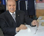 Algerian President Abdelaziz Bouteflika casts his vote in the El Biar district of Algiers, Thursday, April 9, 2009. Algerians voted Thursday in a presidential election that is expected to give the incumbent Abdelaziz Bouteflika another five years to try to quell terrorism and reform the North African country's lackluster economy, which is heavily dependent on oil and gas.