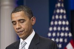 President Barack Obama pauses during a statement on the tax cut bill at the White House on Monday, Dec. 13, 2010 in Washington.