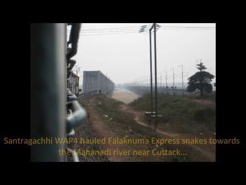 Falaknuma Express Cruises over the Mahanadi River and meets Puri New Delhi Express near Cuttack