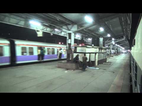 DEPARTING FROM BRILLIANTLY LIT VASAI ROAD RAILWAY STATION IN MUMBAI