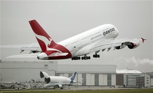 An Airbus A380 superjumbo of Australian Qantas airline starts at the airbus plant in Hamburg, northern Germany, Thursday, Nov. 18, 2010.