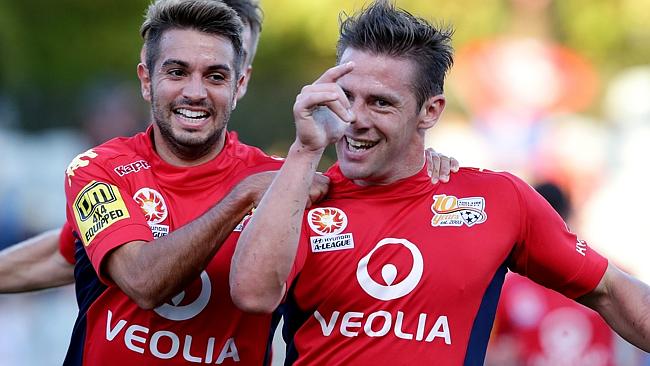 Adelaide United’s Jeronimo, right, celebrates his first-half goal against Wellington Phoe