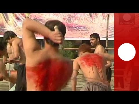 Video: Afghan Shi'ite Muslims beating themselves in memory of martyrdom