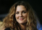 Actress Drew Barrymore arrives at the Los Angeles premiere of "We Are Marshall" in the Hollywood Section of Los Angeles on Thursday, Dec. 14, 2006. (AP Photo/Matt Sayles)